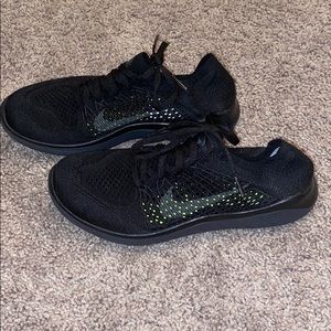 Black Nike Flyknits
